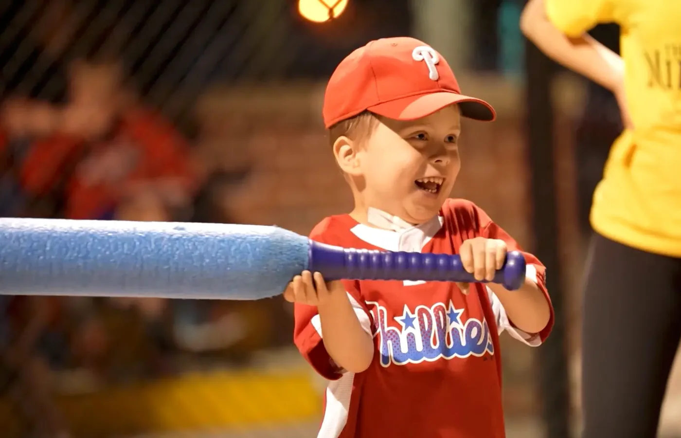 A young Casey's Clubhouse athlete at bat